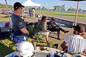 Three Sheets Racing Ford Focus ZX3 team in the pits.