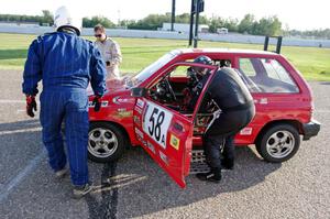 Team Festivus Ford Festiva in the pits.