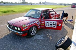 Cheap Shot Racing BMW 325is in the pits.