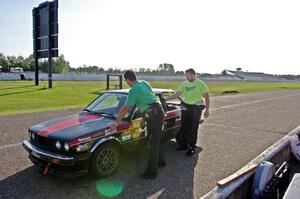 Locked Out Racing BMW 325is in the pits.