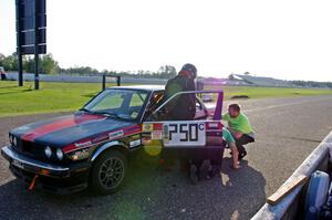 Locked Out Racing BMW 325is in the pits.