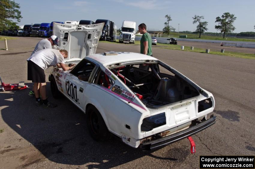 Team My Fairlady Nissan 280ZX spent most of the race behind pit wall.