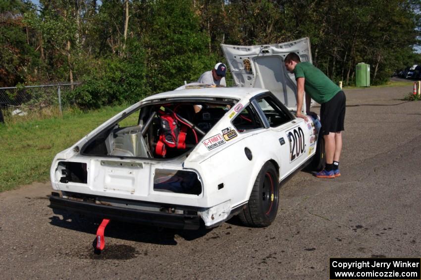 Team My Fairlady Nissan 280ZX spent most of the race behind pit wall.