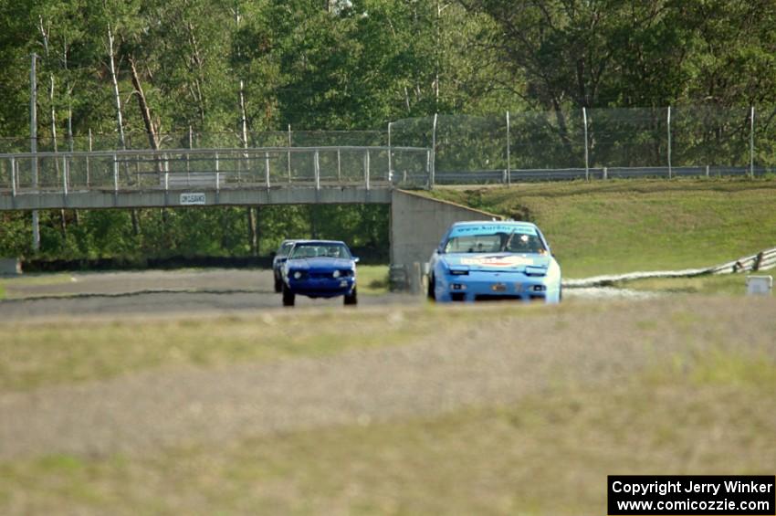 Team McQueen Nissan 240SX and Perpetual Adolescents Racing Ford Mustang