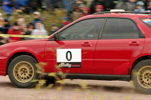 Greg Messler's Subaru WRX Wagon, car '0', comes into the SS1 (Green Acres I) spectator area.