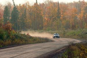 George Plsek / Nathalie Richard Mitsubishi Lancer Evo IX comes through the SS1 (Green Acres I) spectator area.