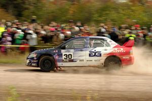 George Plsek / Nathalie Richard Mitsubishi Lancer Evo IX comes through the SS1 (Green Acres I) spectator area.