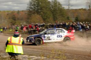 George Plsek / Nathalie Richard Mitsubishi Lancer Evo IX comes through the SS1 (Green Acres I) spectator area.