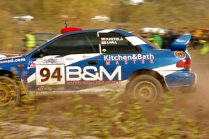 Piotr Fetela / John Hall Subaru Impreza STi comes through the SS1 (Green Acres I) spectator area.