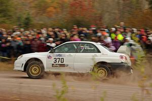 Garry Gill / Steve Harrell Subaru WRX comes through the SS1 (Green Acres I) spectator area.