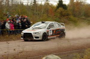 Vio Dobasu / Keith Moriarty Mitsubishi Lancer Evo X comes through the SS1 (Green Acres I) spectator area.