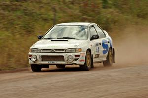 Henry Krolikowski / Cindy Krolikowski Subaru Impreza comes through the SS1 (Green Acres I) spectator area.