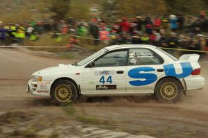 Henry Krolikowski / Cindy Krolikowski Subaru Impreza comes through the SS1 (Green Acres I) spectator area.