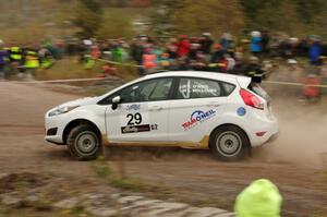 Tim O'Neil / Ian Williams Ford Fiesta R2 comes through the SS1 (Green Acres I) spectator area.