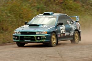 Mike Engle / Brian Arpke Subaru Impreza 2.5RS comes through the SS1 (Green Acres I) spectator area.