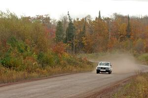 Ian Topping / Jimmy Brandt Volvo 242 comes through the SS1 (Green Acres I) spectator area.