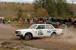 Ian Topping / Jimmy Brandt Volvo 242 comes through the SS1 (Green Acres I) spectator area.
