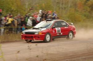 Chuck Surdyke / Colin Vickman Subaru Impreza comes through the SS1 (Green Acres I) spectator area.