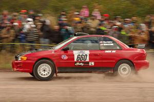 Chuck Surdyke / Colin Vickman Subaru Impreza comes through the SS1 (Green Acres I) spectator area.