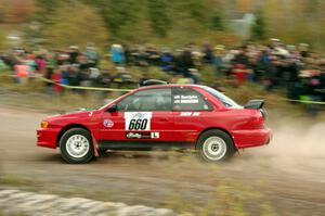 Chuck Surdyke / Colin Vickman Subaru Impreza comes through the SS1 (Green Acres I) spectator area.