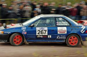 Dylan Helferich / Drake Dunigan Subaru Impreza comes through the SS1 (Green Acres I) spectator area.