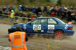 Dylan Helferich / Drake Dunigan Subaru Impreza comes through the SS1 (Green Acres I) spectator area.