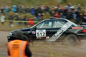 Corey Holmes / Dustin Masters Subaru Impreza comes through the SS1 (Green Acres I) spectator area.