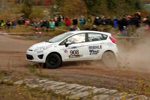 Justin Kollien / Daniel Garant Ford Fiesta R1 comes through the SS1 (Green Acres I) spectator area.