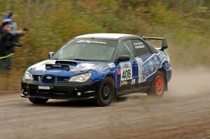 Mitchell Kelly / Weston Bailey Subaru Impreza comes through the SS1 (Green Acres I) spectator area.