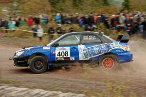 Mitchell Kelly / Weston Bailey Subaru Impreza comes through the SS1 (Green Acres I) spectator area.