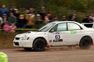 Reid Andress / Neil Moser Subaru WRX comes through the SS1 (Green Acres I) spectator area.