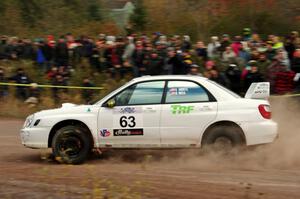 Reid Andress / Neil Moser Subaru WRX comes through the SS1 (Green Acres I) spectator area.