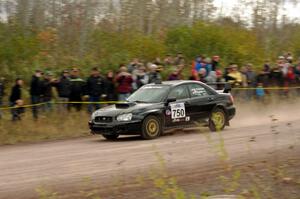 Meredith Pritchard / Rachelle Kaltak Subaru Impreza comes through the SS1 (Green Acres I) spectator area.