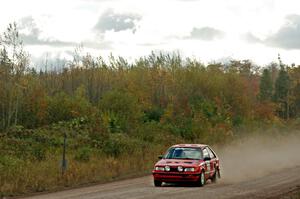 Jimmy Pelizzari / Sara Stevens Mazda 323GTX comes through the SS1 (Green Acres I) spectator area.