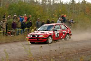 Jimmy Pelizzari / Kate Stevens Mazda 323GTX comes through the SS1 (Green Acres I) spectator area.