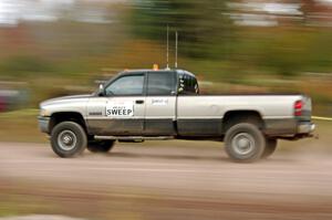 A heavy sweep truck comes through the SS1 (Green Acres I) spectator area.