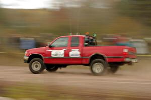 A heavy sweep truck comes through the SS1 (Green Acres I) spectator area.