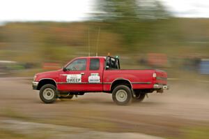 A heavy sweep truck comes through the SS1 (Green Acres I) spectator area.