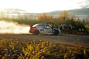 George Plsek / Nathalie Richard Mitsubishi Lancer Evo IX comes through the SS15 (Green Acres II) spectator area.