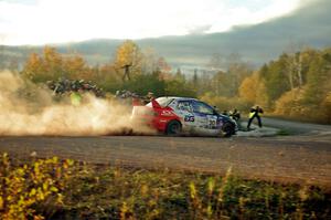 George Plsek / Nathalie Richard Mitsubishi Lancer Evo IX comes through the SS15 (Green Acres II) spectator area.