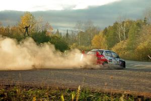 George Plsek / Nathalie Richard Mitsubishi Lancer Evo IX comes through the SS15 (Green Acres II) spectator area.