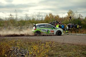 Arkadiusz Gruszka / Lukasz Wronski Mitsubishi Mirage RS comes through the SS15 (Green Acres II) spectator area.