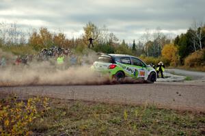 Arkadiusz Gruszka / Lukasz Wronski Mitsubishi Mirage RS comes through the SS15 (Green Acres II) spectator area.