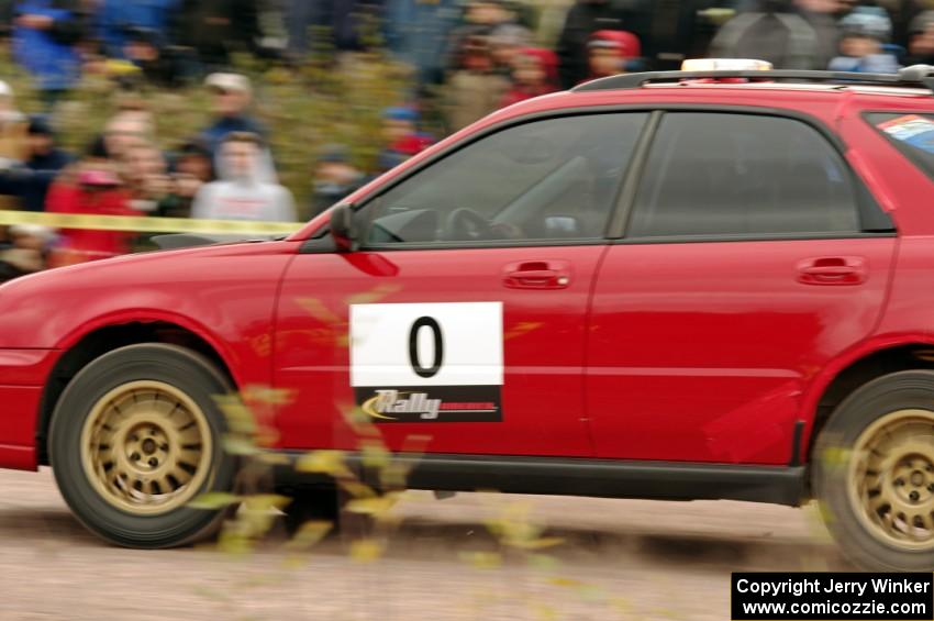 Greg Messler's Subaru WRX Wagon, car '0', comes into the SS1 (Green Acres I) spectator area.