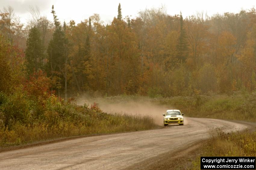 Lauchlin O'Sullivan / Scott Putnam Subaru WRX STi comes through the SS1 (Green Acres I) spectator area.