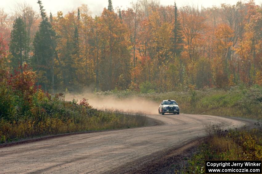 George Plsek / Nathalie Richard Mitsubishi Lancer Evo IX comes through the SS1 (Green Acres I) spectator area.