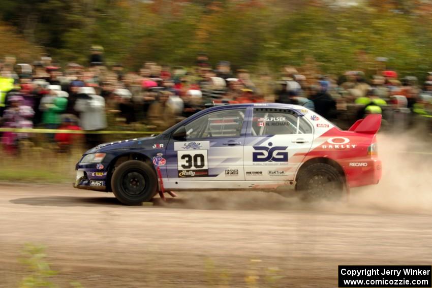 George Plsek / Nathalie Richard Mitsubishi Lancer Evo IX comes through the SS1 (Green Acres I) spectator area.