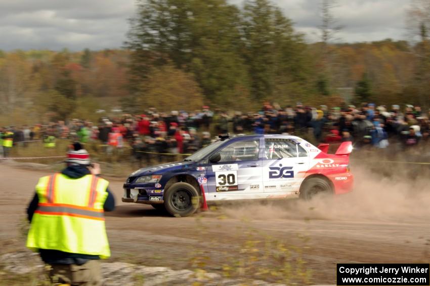 George Plsek / Nathalie Richard Mitsubishi Lancer Evo IX comes through the SS1 (Green Acres I) spectator area.