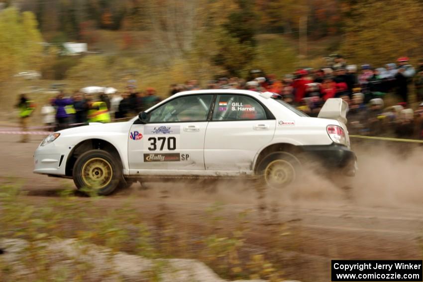 Garry Gill / Steve Harrell Subaru WRX comes through the SS1 (Green Acres I) spectator area.