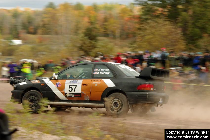 Jake Marsack / Dane Marsack Subaru WRX comes through the SS1 (Green Acres I) spectator area.